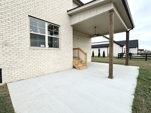 view of patio / terrace featuring ceiling fan