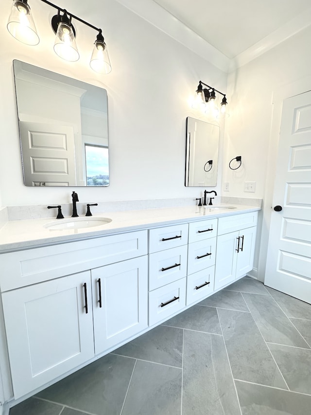 bathroom featuring vanity and crown molding