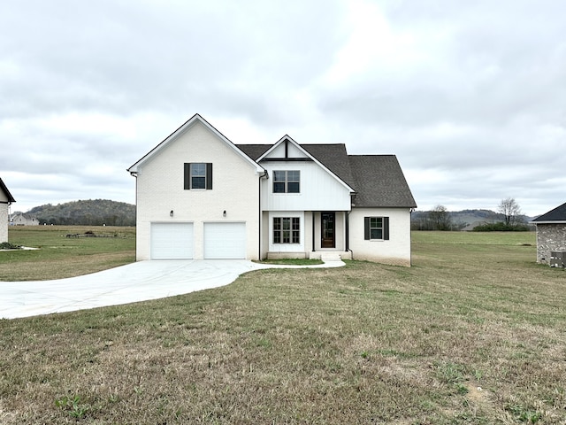 modern farmhouse with a garage and a front yard