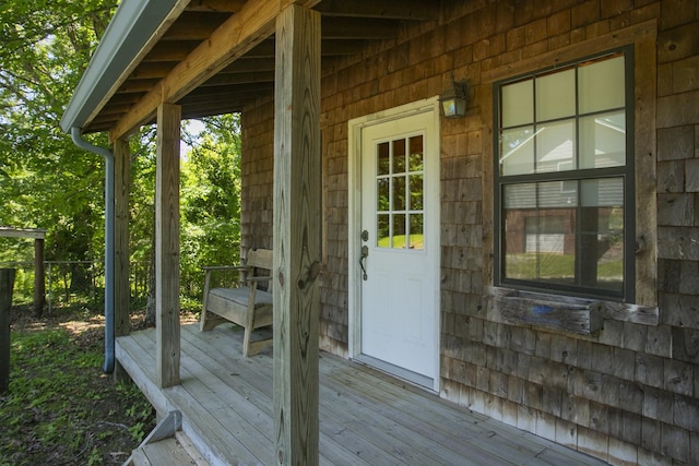 entrance to property with a wooden deck