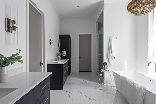 bathroom featuring tile floors, crown molding, a chandelier, and vanity