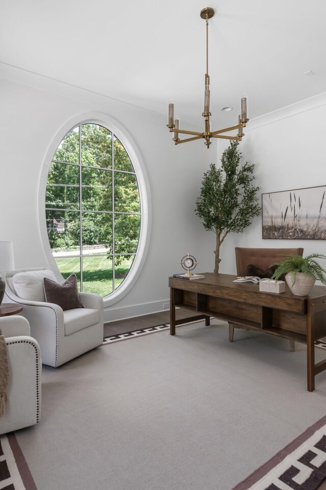 living room featuring an inviting chandelier, carpet, and ornamental molding