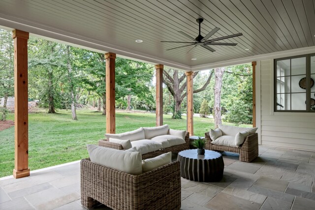 view of patio featuring ceiling fan and an outdoor living space