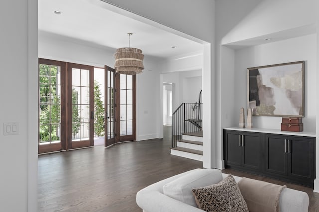 entryway with french doors and dark wood-type flooring