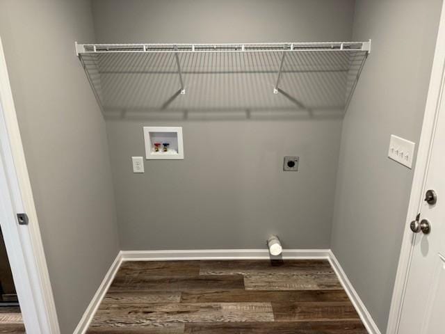 laundry room with dark wood-type flooring, hookup for an electric dryer, and hookup for a washing machine