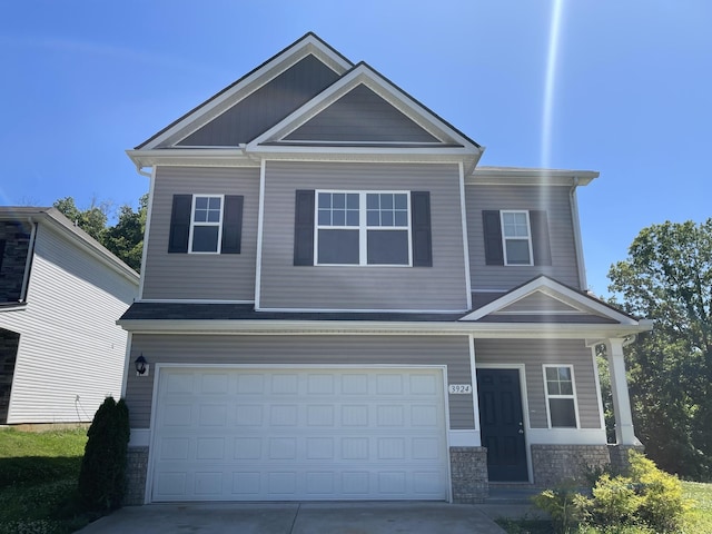 craftsman-style home with a garage