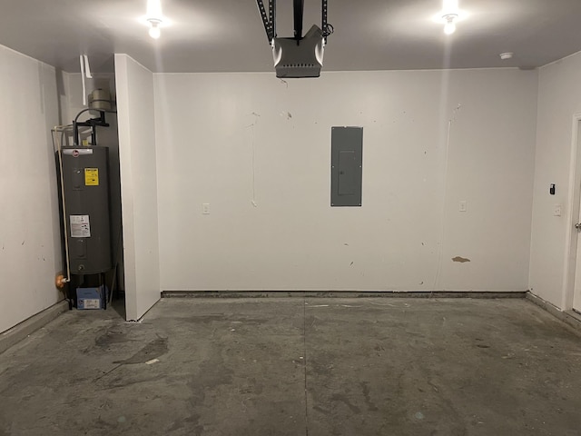 garage featuring electric panel, a garage door opener, and water heater