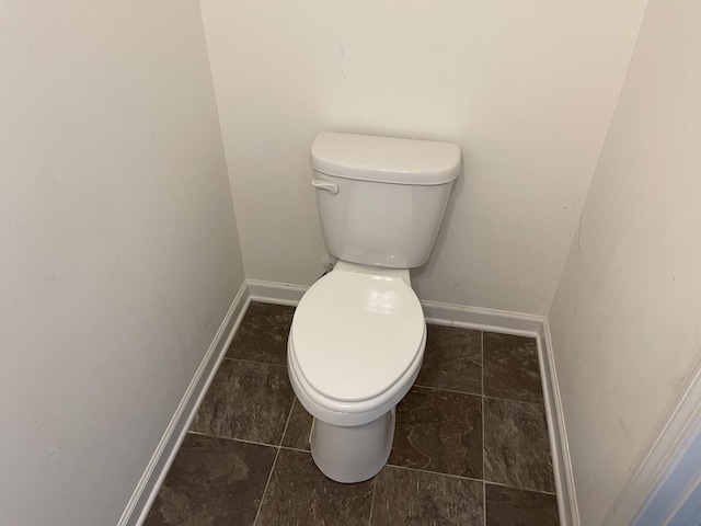 bathroom featuring toilet