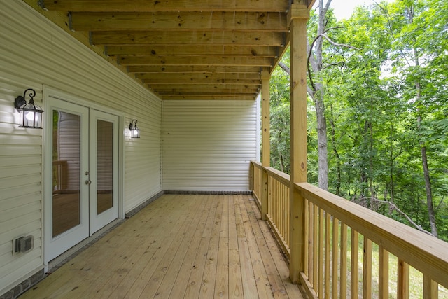 wooden deck featuring french doors