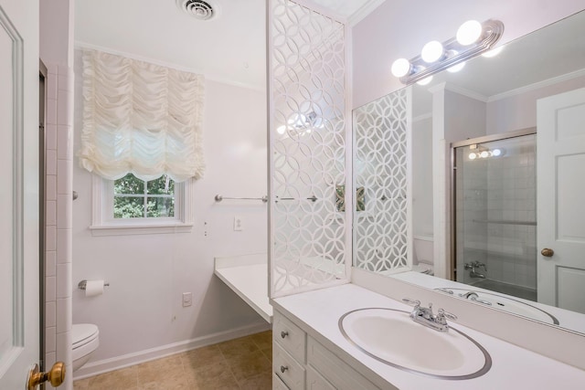 bathroom featuring vanity, tile patterned flooring, toilet, ornamental molding, and an enclosed shower