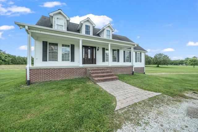 view of front of house with a porch and a front lawn