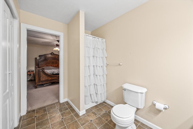 bathroom featuring tile patterned floors, ceiling fan, walk in shower, and toilet