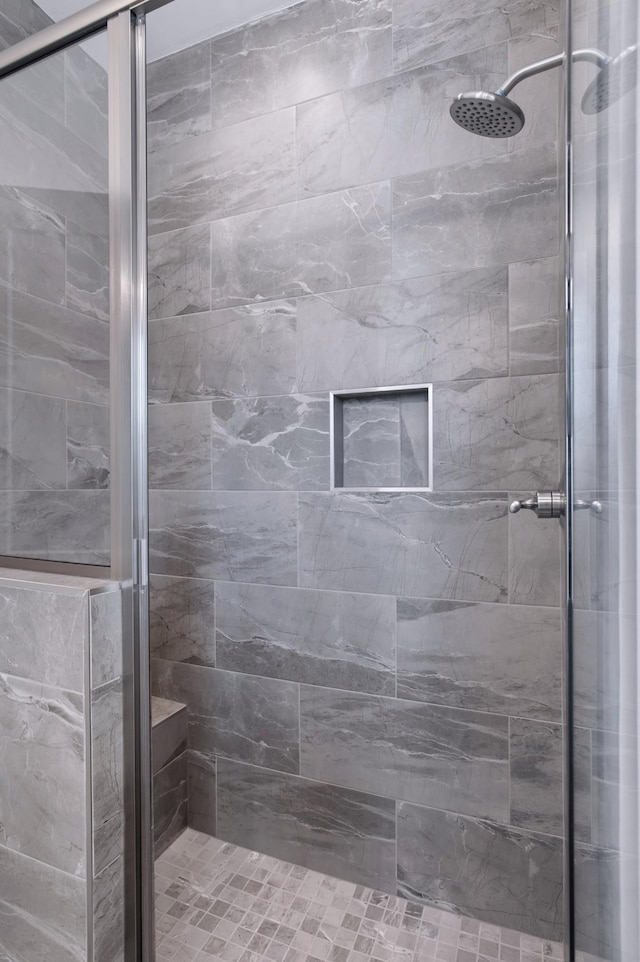 bathroom featuring walk in shower