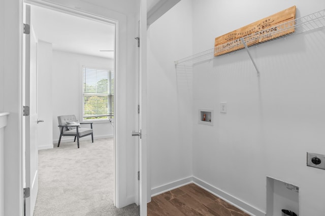 laundry room with washer hookup, electric dryer hookup, and hardwood / wood-style floors