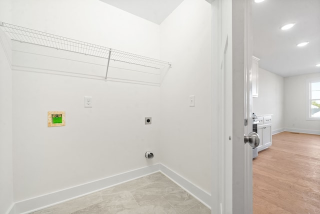 clothes washing area with hookup for an electric dryer