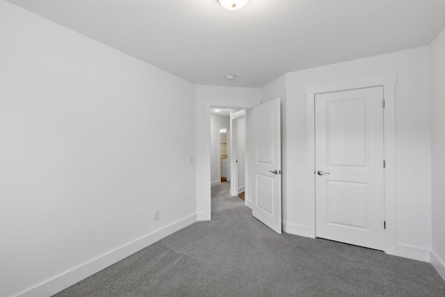 unfurnished bedroom with carpet