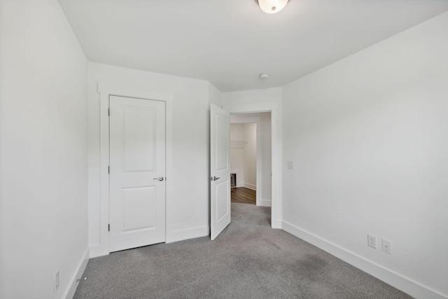 unfurnished bedroom featuring carpet floors