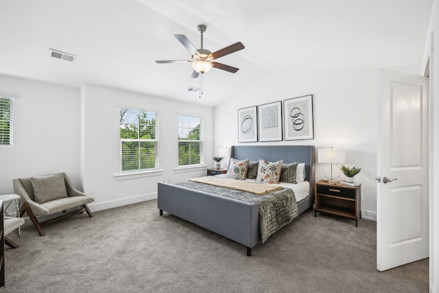 bedroom with carpet flooring, ceiling fan, and vaulted ceiling with beams