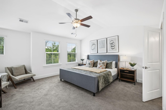 carpeted bedroom featuring ceiling fan and lofted ceiling with beams