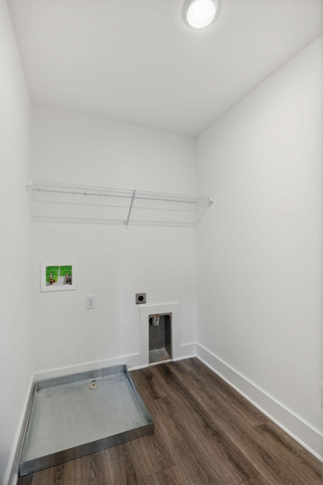 clothes washing area with washer hookup, dark hardwood / wood-style floors, and electric dryer hookup