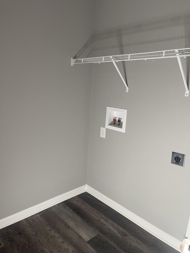 laundry area with laundry area, dark wood finished floors, electric dryer hookup, baseboards, and hookup for a washing machine
