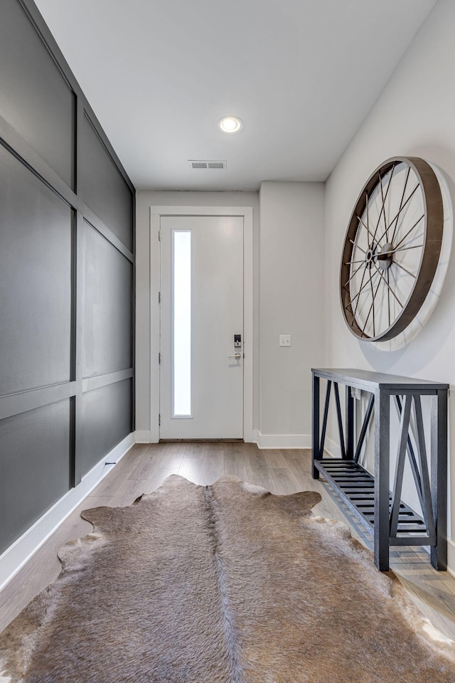 foyer entrance featuring light wood-type flooring