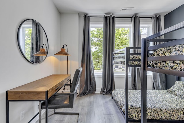 bedroom featuring light wood-type flooring