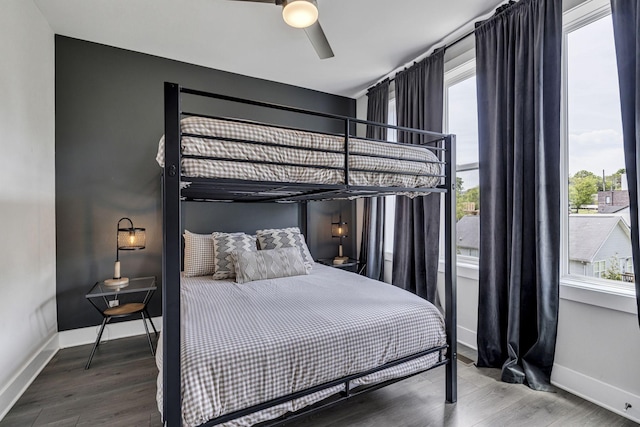 bedroom featuring ceiling fan and wood-type flooring