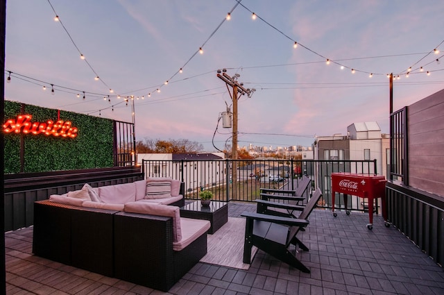 patio terrace at dusk with an outdoor living space