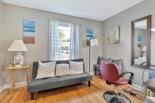 home office with light hardwood / wood-style flooring