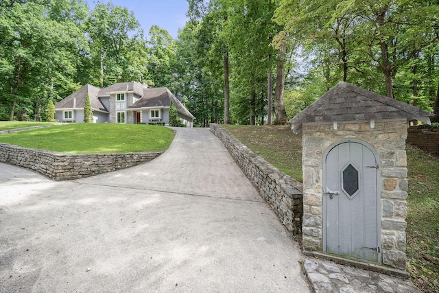 exterior space with a front lawn