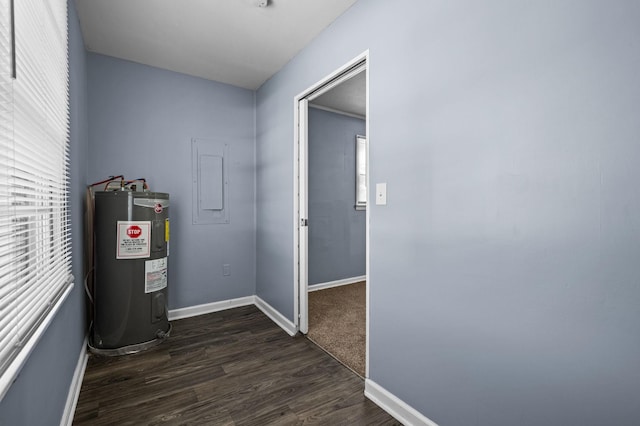 utility room featuring water heater