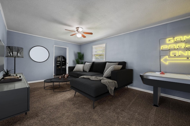 carpeted living room featuring ceiling fan, ornamental molding, and a textured ceiling