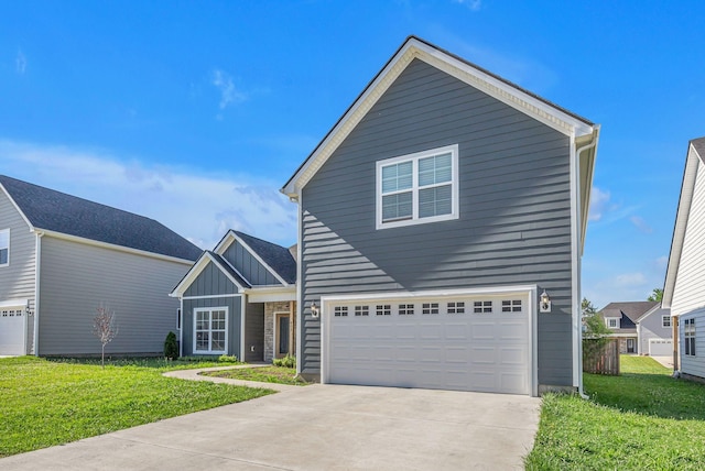 front facade featuring a front yard and a garage