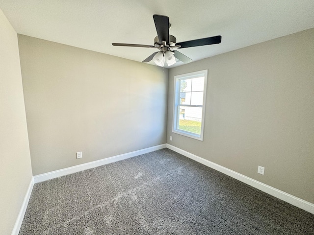 carpeted empty room with ceiling fan