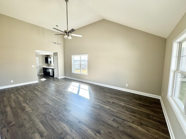 unfurnished living room with dark hardwood / wood-style flooring, high vaulted ceiling, and ceiling fan