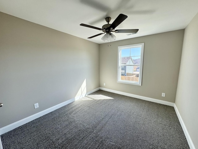 unfurnished room featuring carpet and ceiling fan