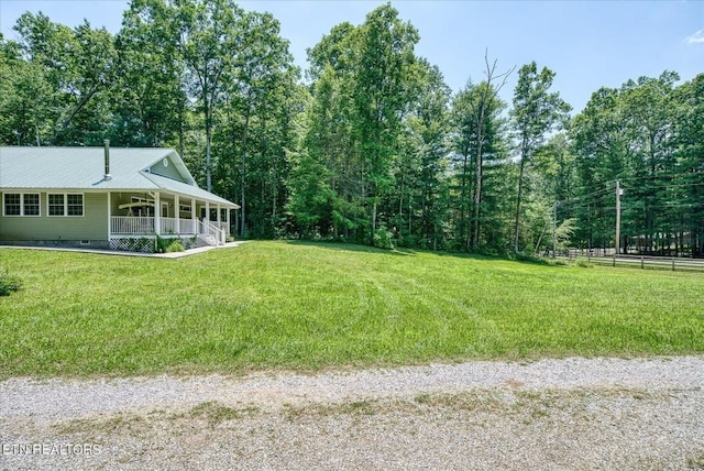 view of yard featuring a porch