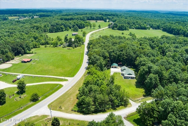 birds eye view of property featuring a rural view