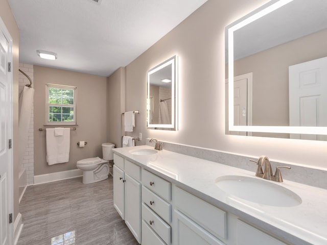 full bathroom featuring vanity with extensive cabinet space, toilet, tile flooring, double sink, and shower / tub combo with curtain