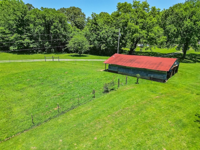 view of nearby features with a yard and a rural view