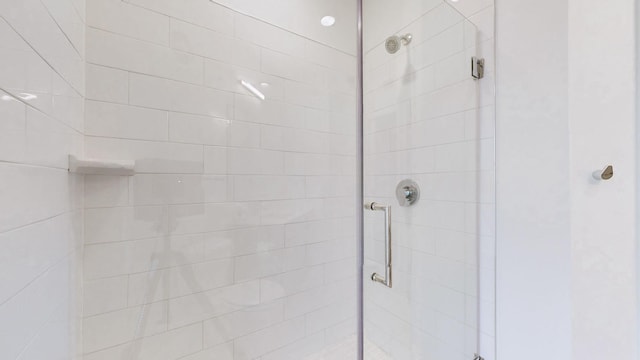 bathroom featuring an enclosed shower