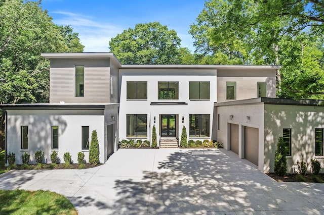 modern home featuring a garage