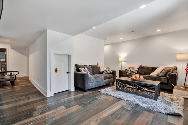 living room with dark wood-type flooring