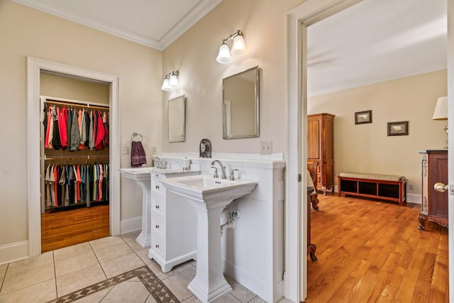 bathroom featuring tile patterned floors and ornamental molding