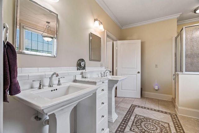 bathroom with tile patterned floors, a shower with shower door, and crown molding