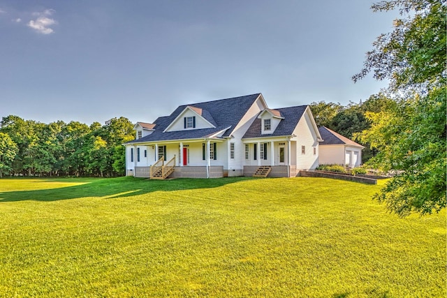 cape cod-style house with covered porch and a front yard