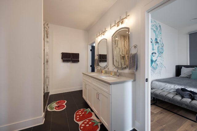 bathroom with vanity and wood-type flooring