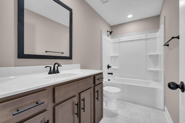 bathroom with visible vents, toilet, marble finish floor, vanity, and shower / washtub combination