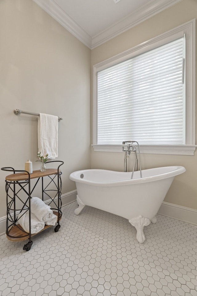 bathroom featuring a bath to relax in, tile flooring, and crown molding